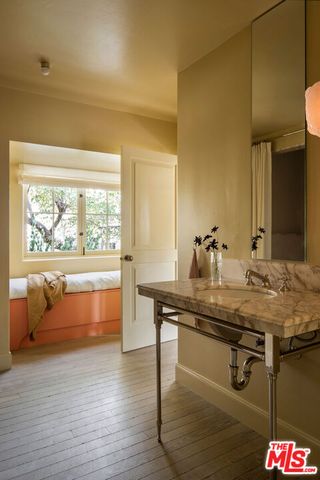 a view of bathroom with dual sinks