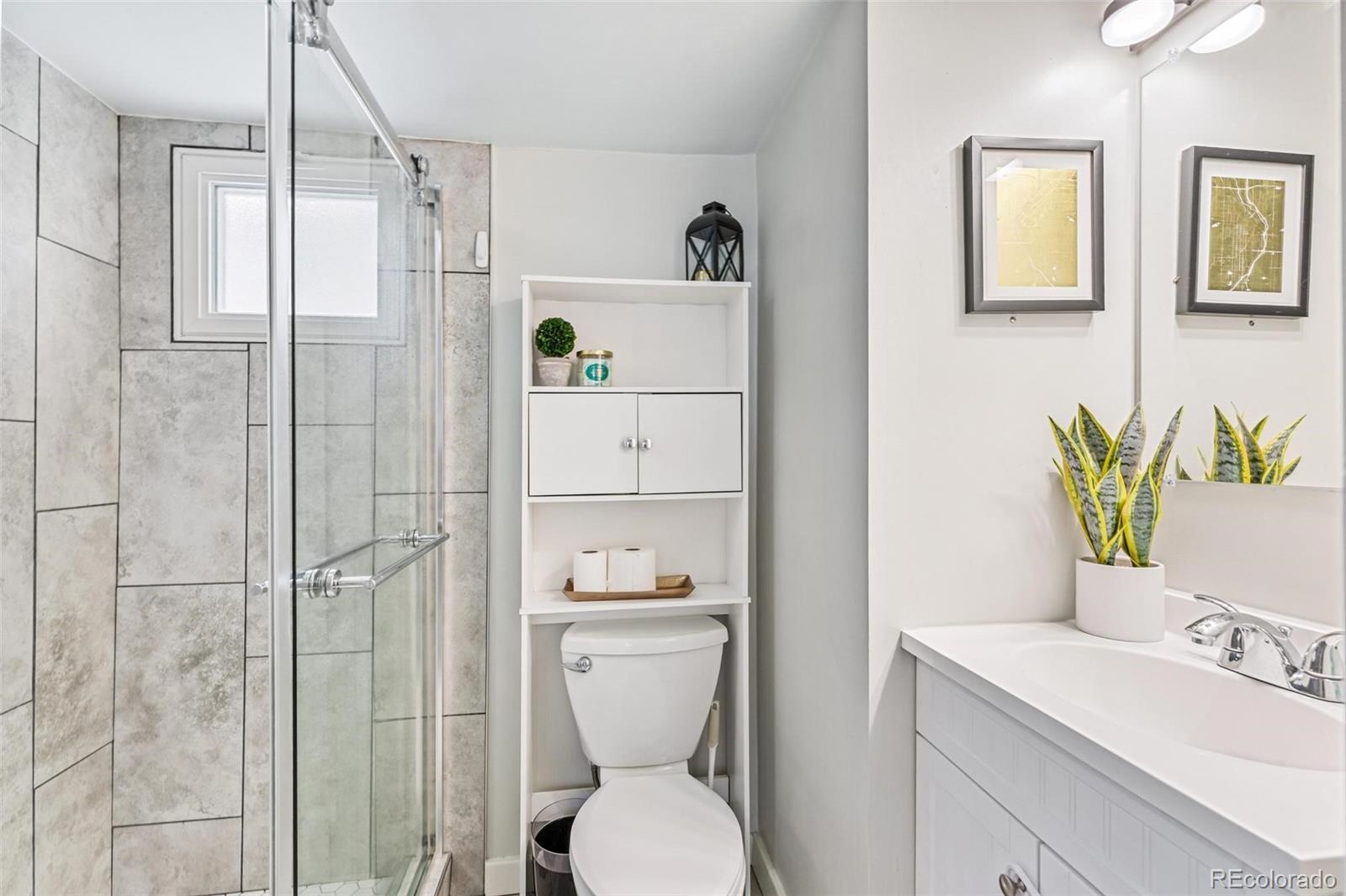 3612 Perry Street Denver, CO 80212 - Photo 28 of 50 a bathroom with a sink toilet and shower