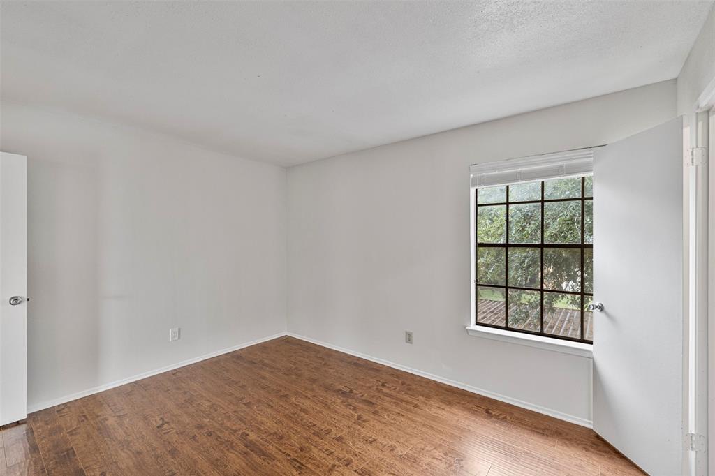 5335 Bent Tree Forest Drive, Unit 288 Dallas, TX 75248 - Photo 19 of 27 a view of a room that has a window in it