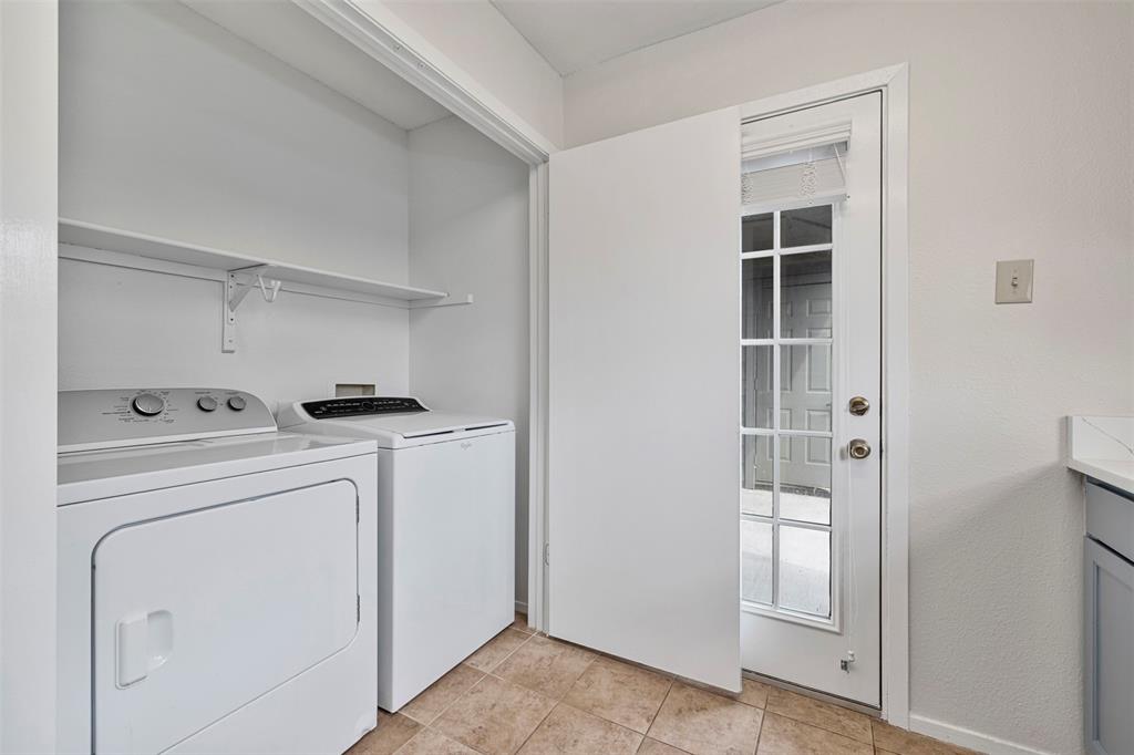 5335 Bent Tree Forest Drive, Unit 288 Dallas, TX 75248 - Photo 23 of 27 a utility room with dryer and washer