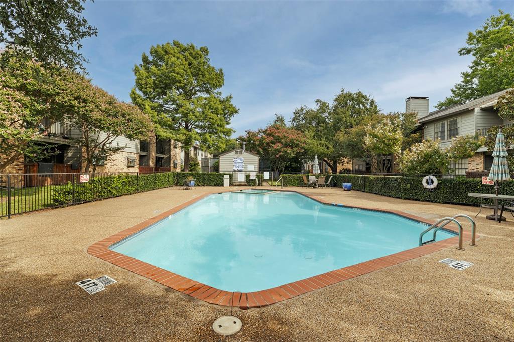 5335 Bent Tree Forest Drive, Unit 288 Dallas, TX 75248 - Photo 24 of 27 a view of outdoor space yard swimming pool and patio