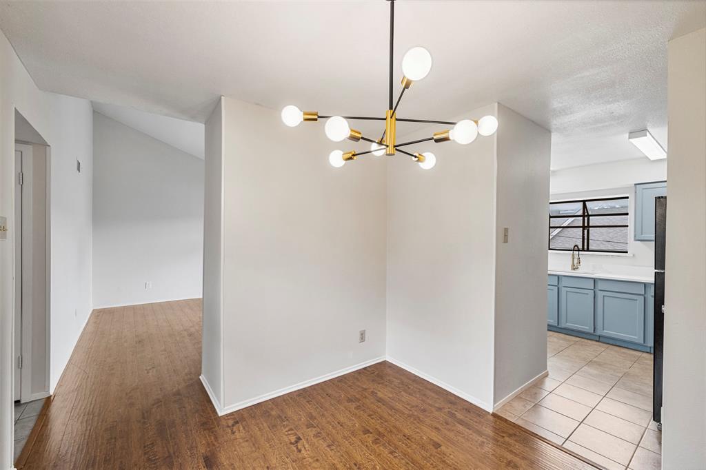 5335 Bent Tree Forest Drive, Unit 288 Dallas, TX 75248 - Photo 3 of 27 a view of a room with a flat screen tv