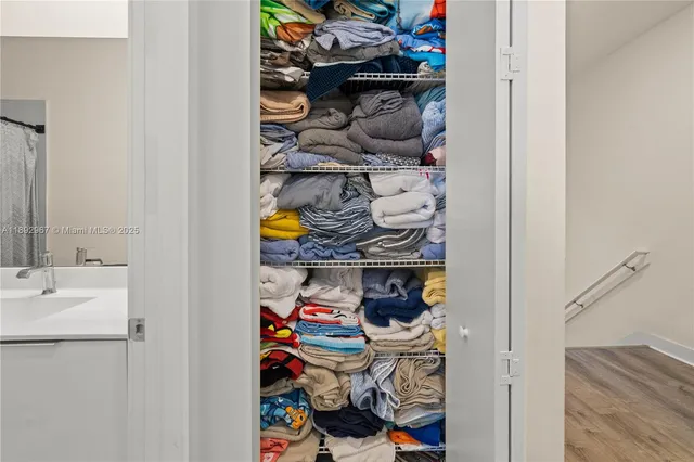 a bedroom with a bed and furniture