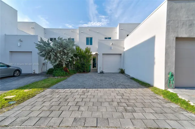 a car parked in front of a house