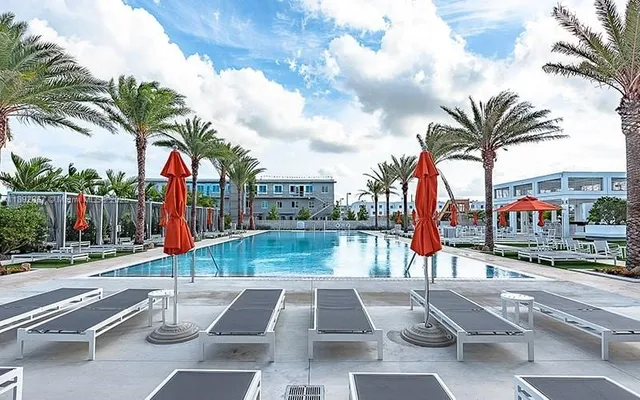 a view of a patio with a table and chairs