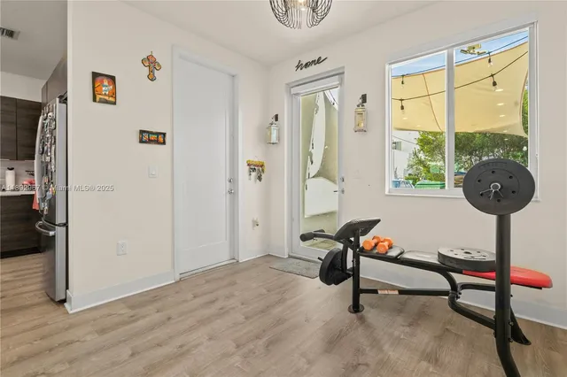 a living room with furniture and a window