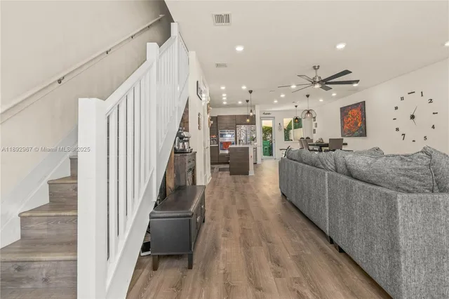 a view of entryway with wooden floor