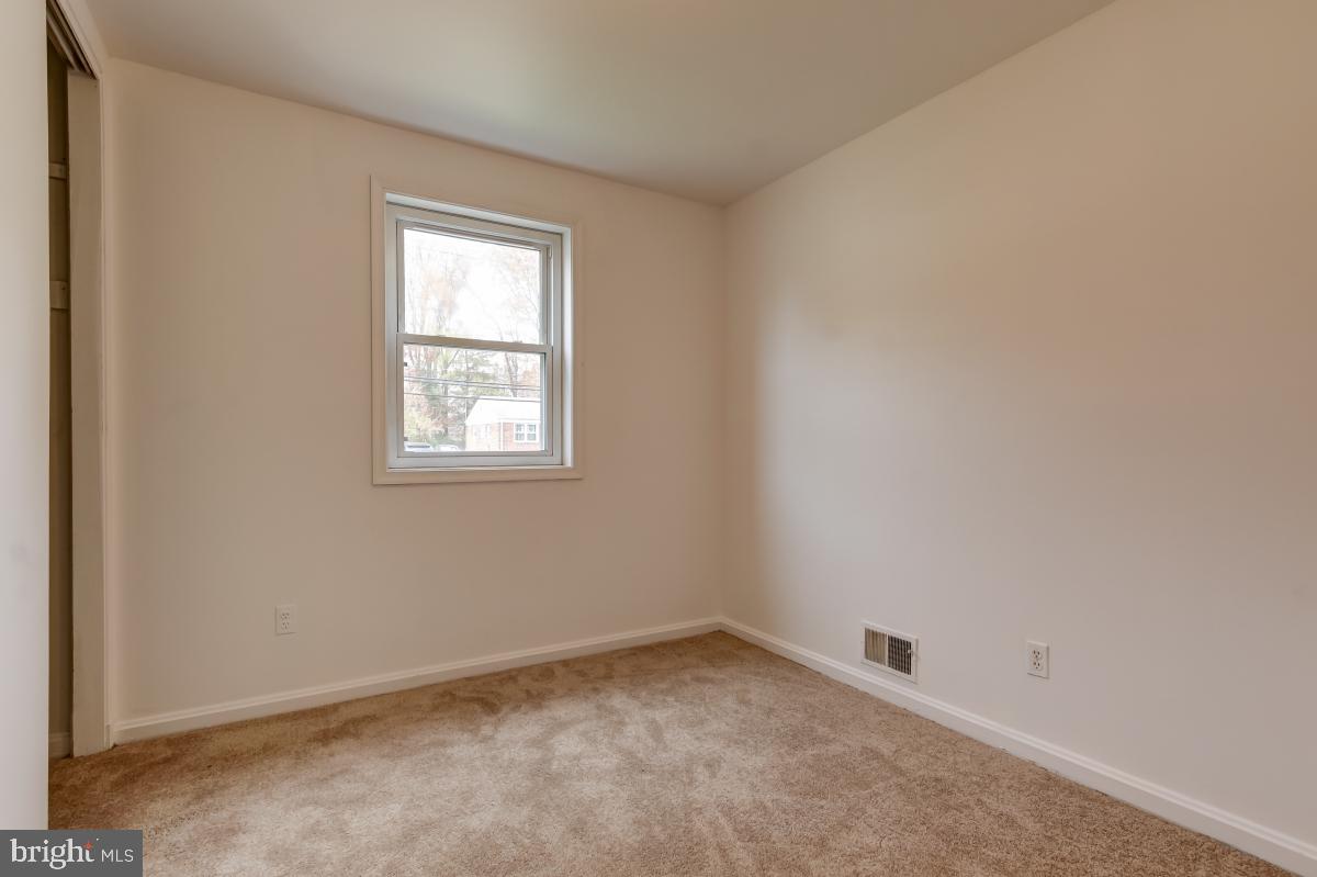 11911 Rocking Horse Road Rockville, MD 20852 - Photo 14 of 27 Bedroom 1 with new neutral carpet.
