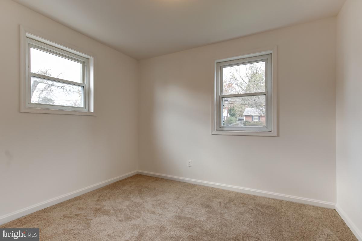 11911 Rocking Horse Road Rockville, MD 20852 - Photo 16 of 27 Bedroom 2 with new neutral carpet.