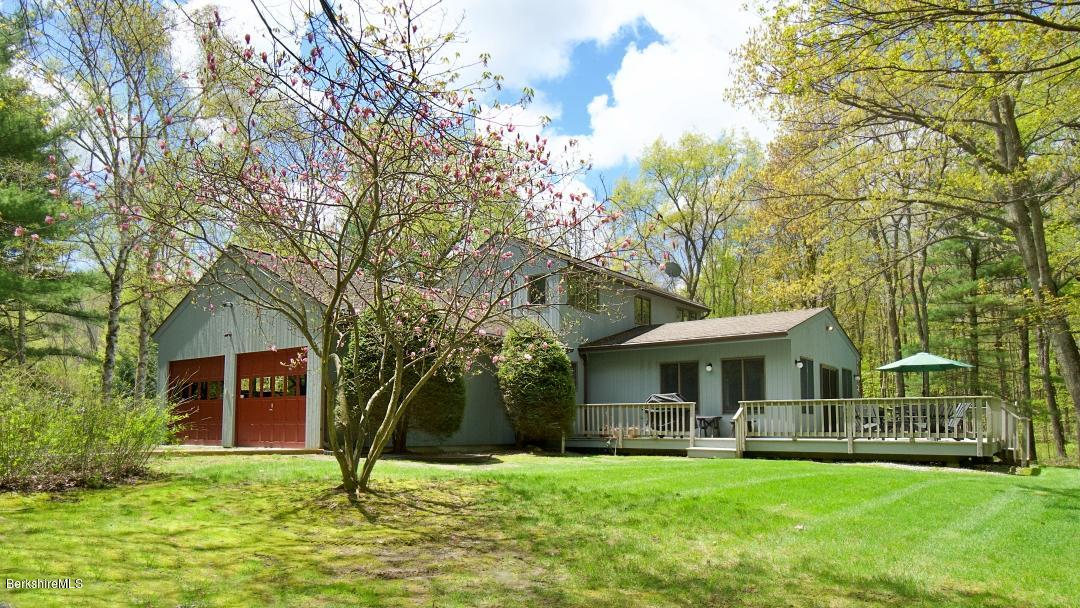 8 Austerlitz Road West Stockbridge, MA 01266 - Photo 1 of 24 a front view of a house with a garden