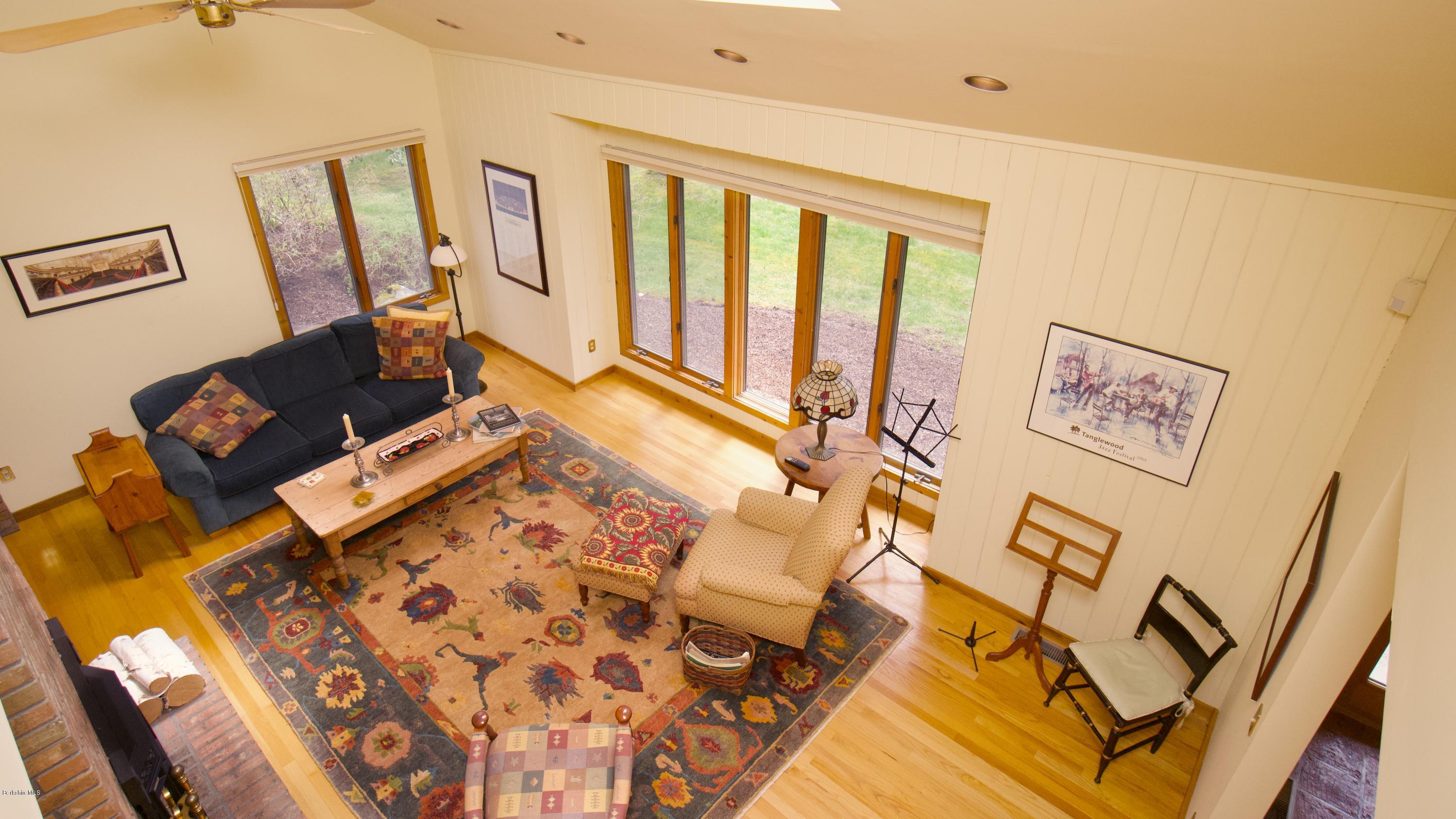 8 Austerlitz Road West Stockbridge, MA 01266 - Photo 5 of 24 a living room with a couch and a table