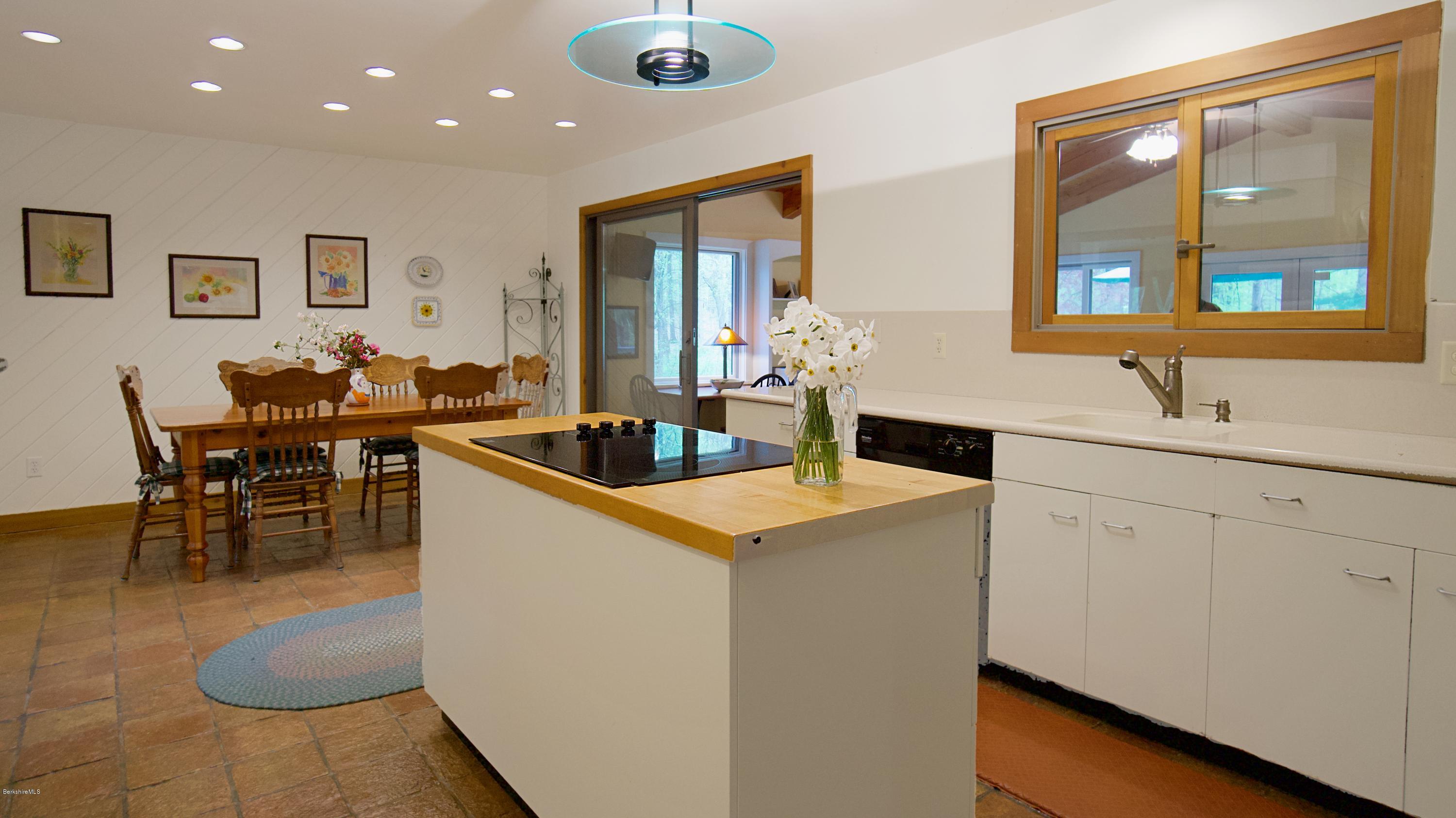 8 Austerlitz Road West Stockbridge, MA 01266 - Photo 8 of 24 a large kitchen with a table and chairs