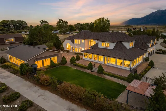 a view of a big yard with potted plants