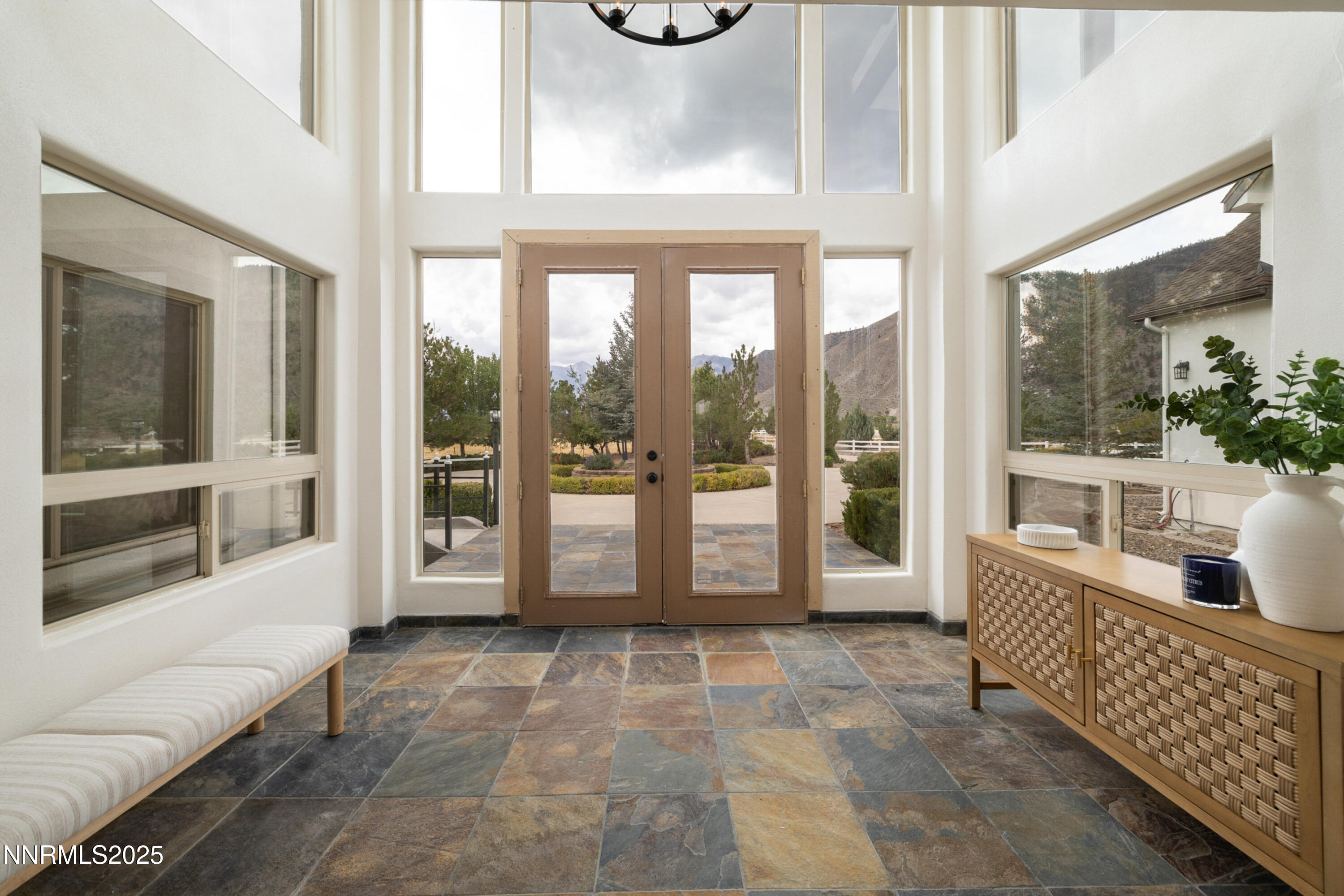 370 Genoa Lane Minden, NV 89423 - Photo 17 of 54 a living room with furniture and a large window