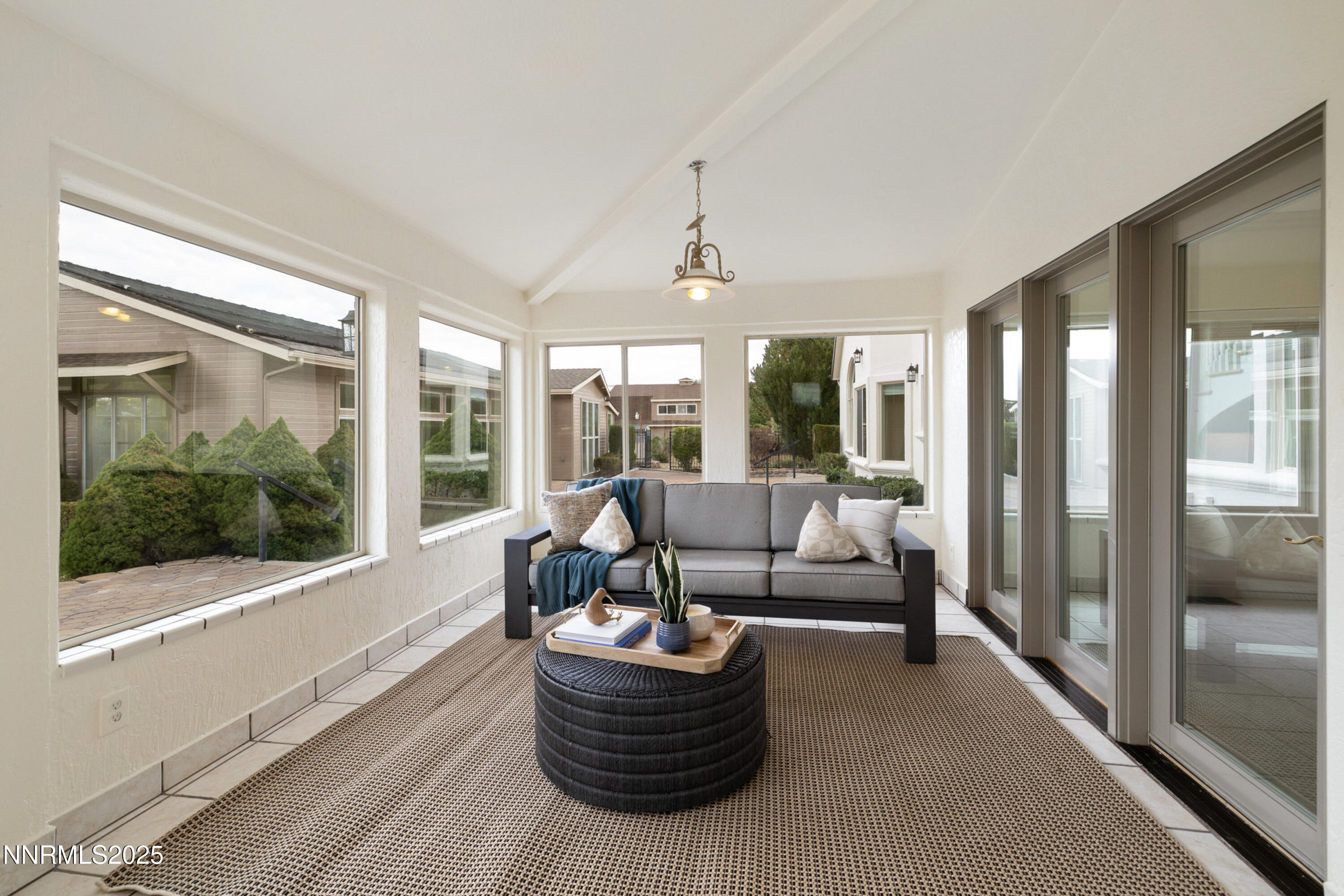 370 Genoa Lane Minden, NV 89423 - Photo 24 of 54 a living room with furniture and a large window