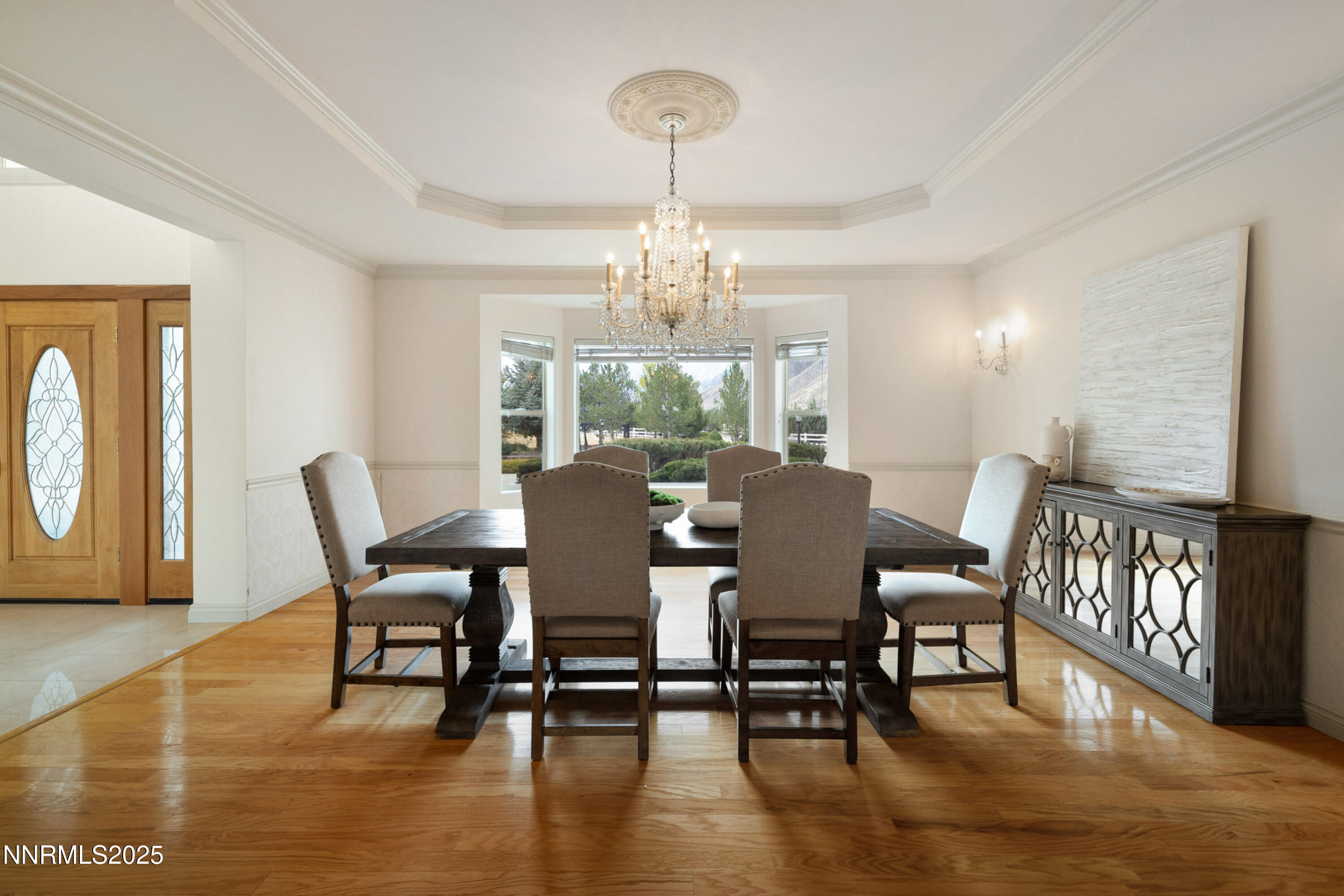 370 Genoa Lane Minden, NV 89423 - Photo 27 of 54 a view of a dining room with furniture window and wooden floor