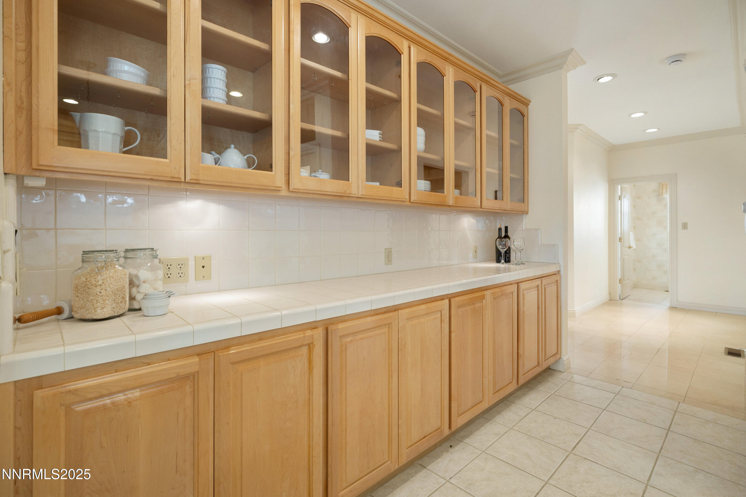 370 Genoa Lane Minden, NV 89423 - Photo 28 of 54 a kitchen with stainless steel appliances granite countertop a sink and cabinets