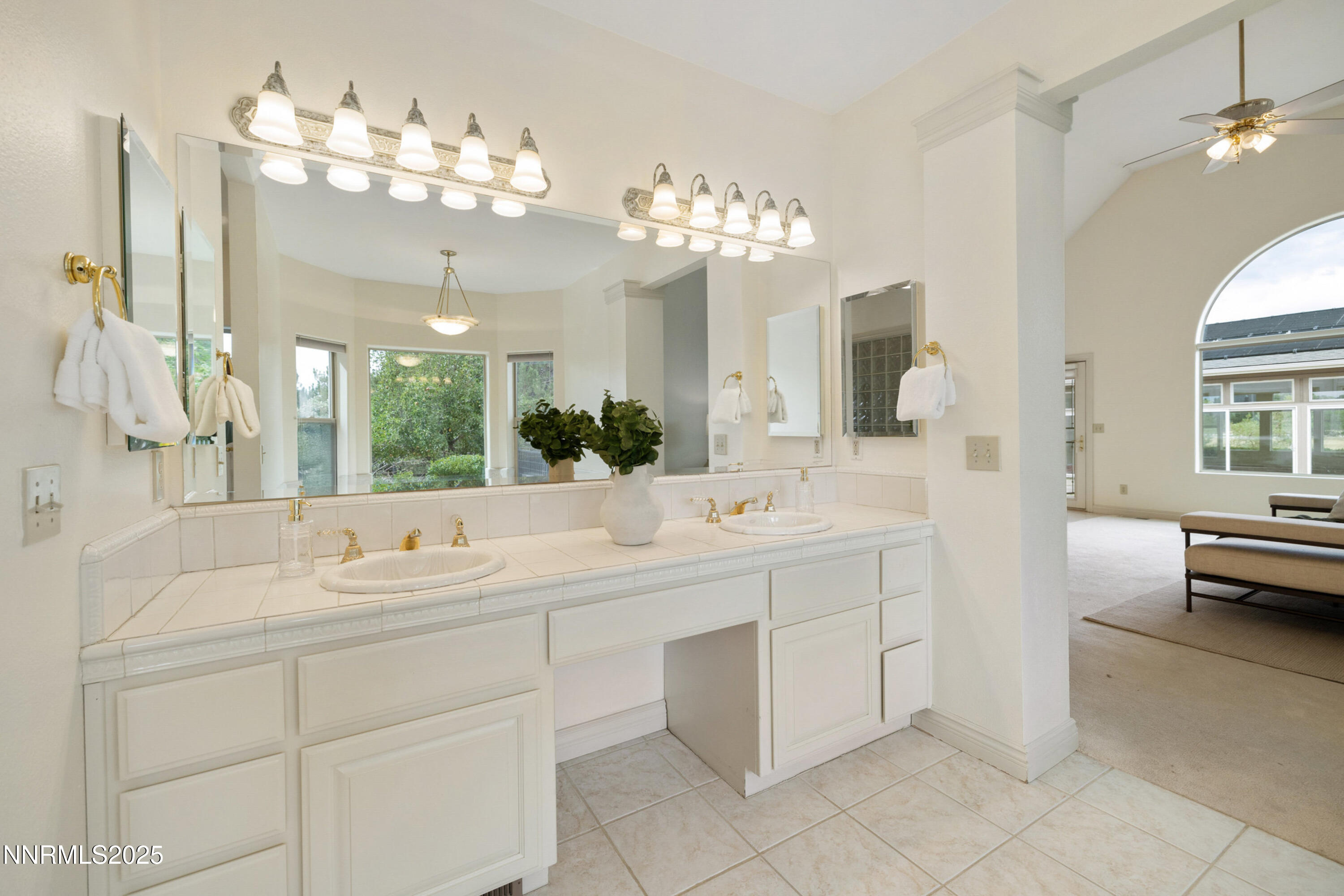 370 Genoa Lane Minden, NV 89423 - Photo 35 of 54 a bathroom with a sink vanity and mirror