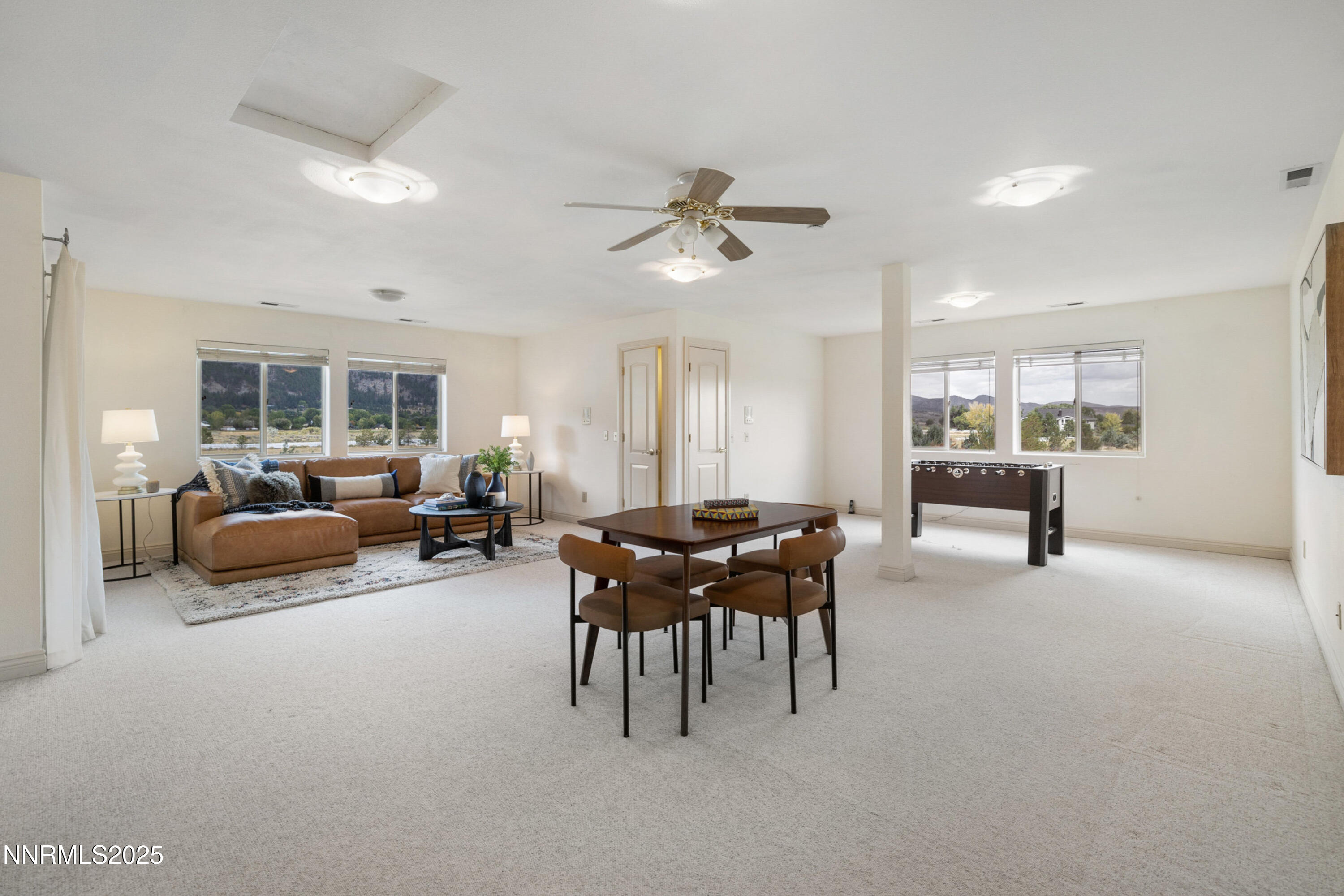 370 Genoa Lane Minden, NV 89423 - Photo 38 of 54 a living room with furniture and a table