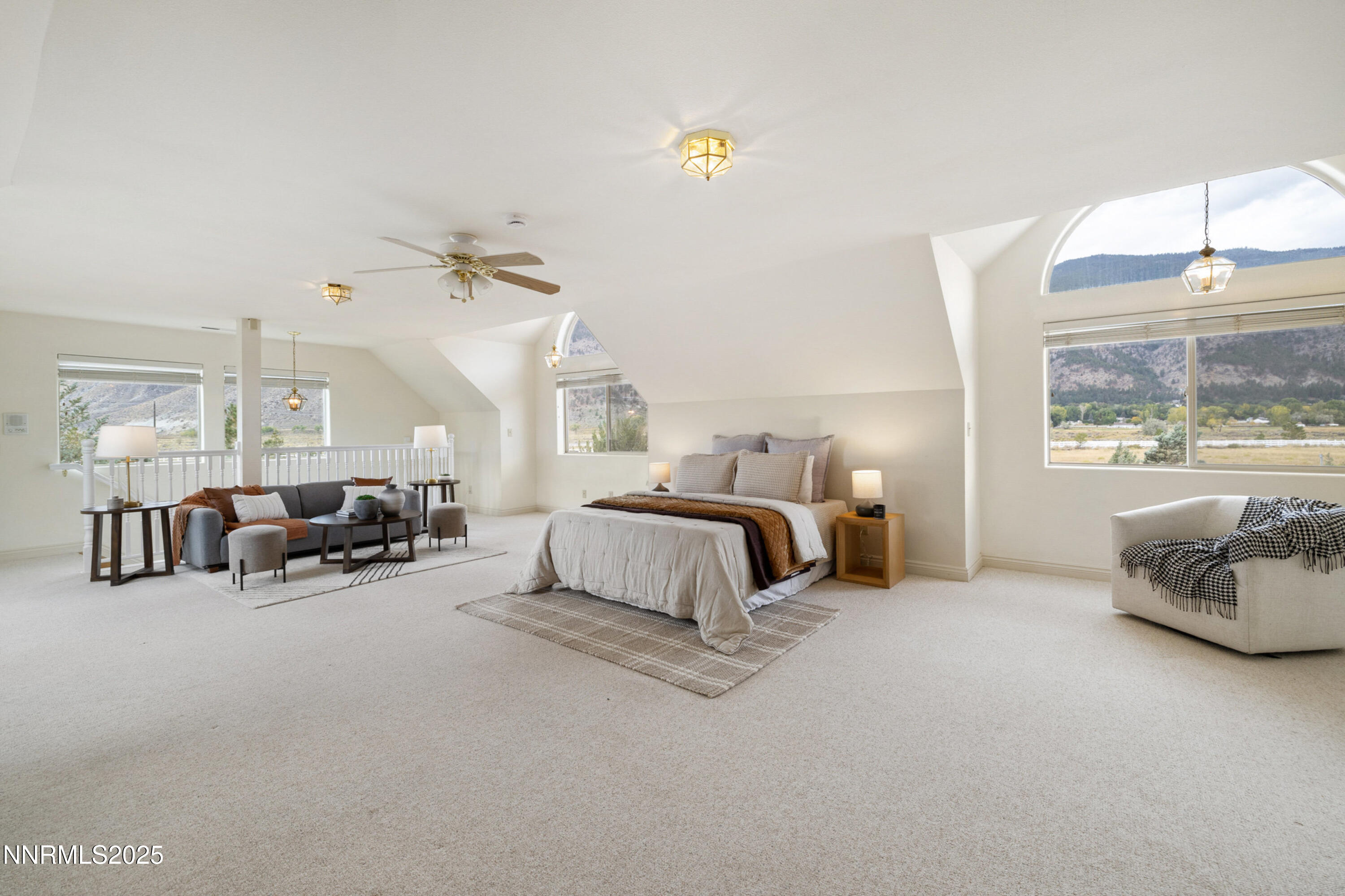 370 Genoa Lane Minden, NV 89423 - Photo 42 of 54 a spacious bedroom with a bed and a window