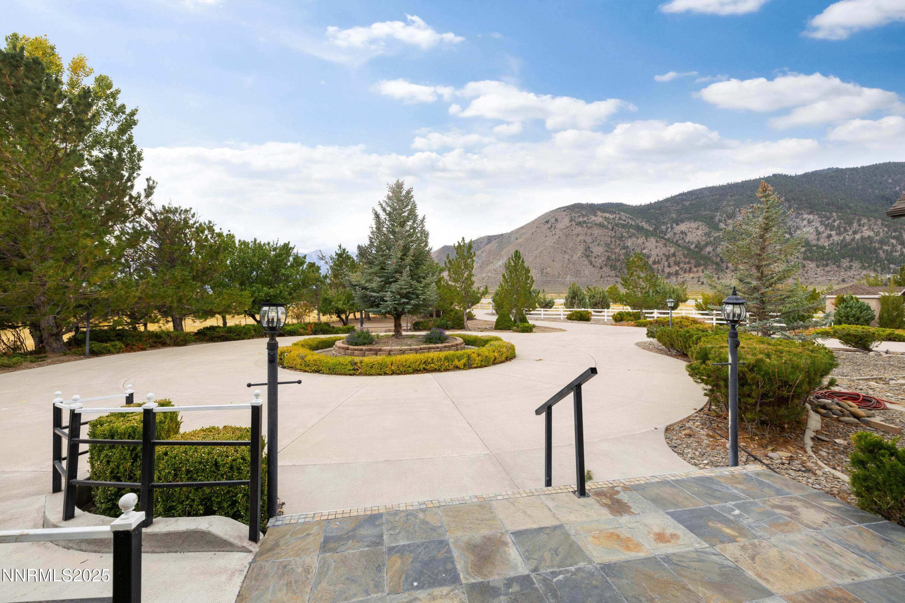 370 Genoa Lane Minden, NV 89423 - Photo 48 of 54 a view of a swimming pool with a lounge chair