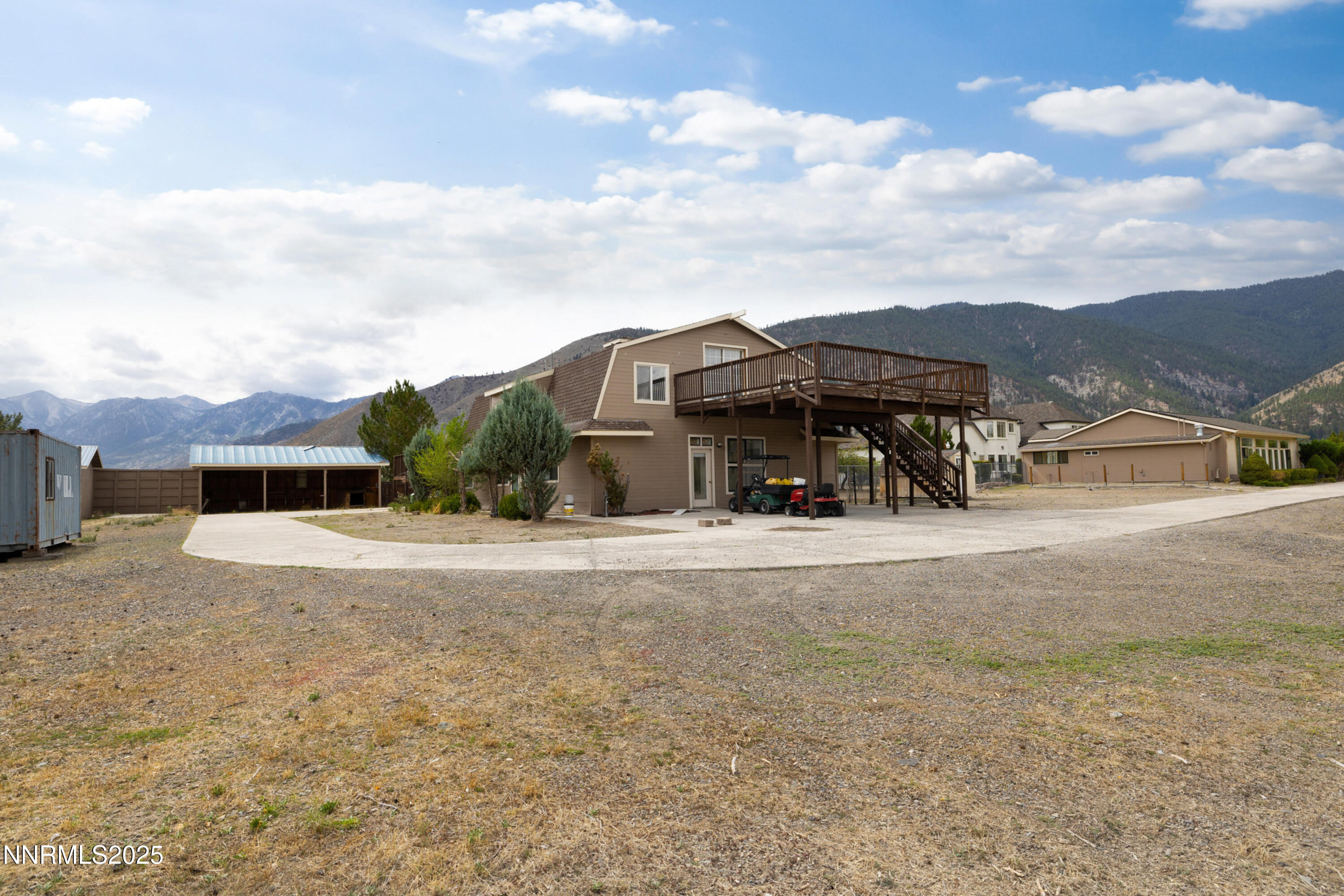 370 Genoa Lane Minden, NV 89423 - Photo 50 of 54 a view of a house with a yard and sitting area