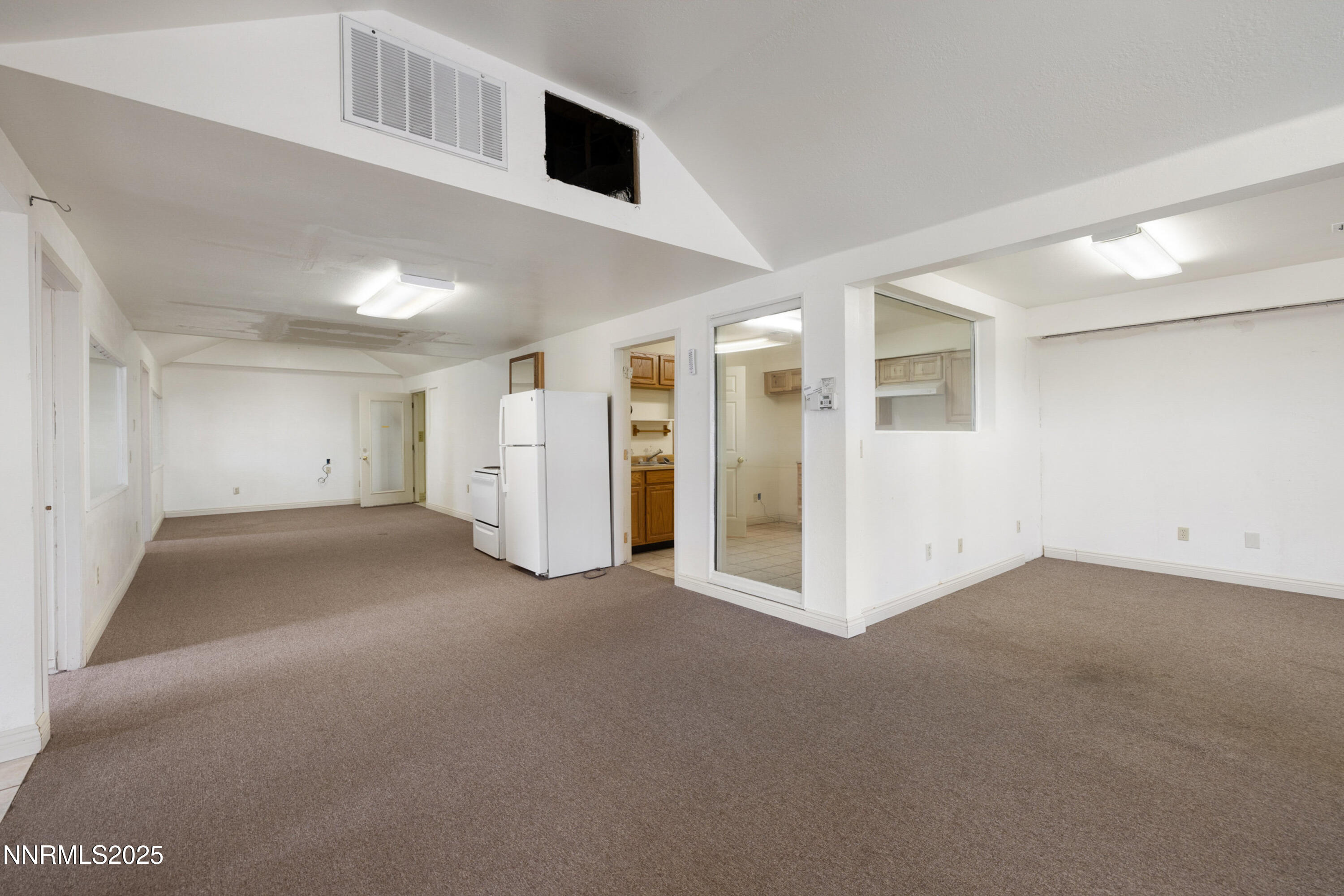370 Genoa Lane Minden, NV 89423 - Photo 51 of 54 a view of a big room with closet and windows