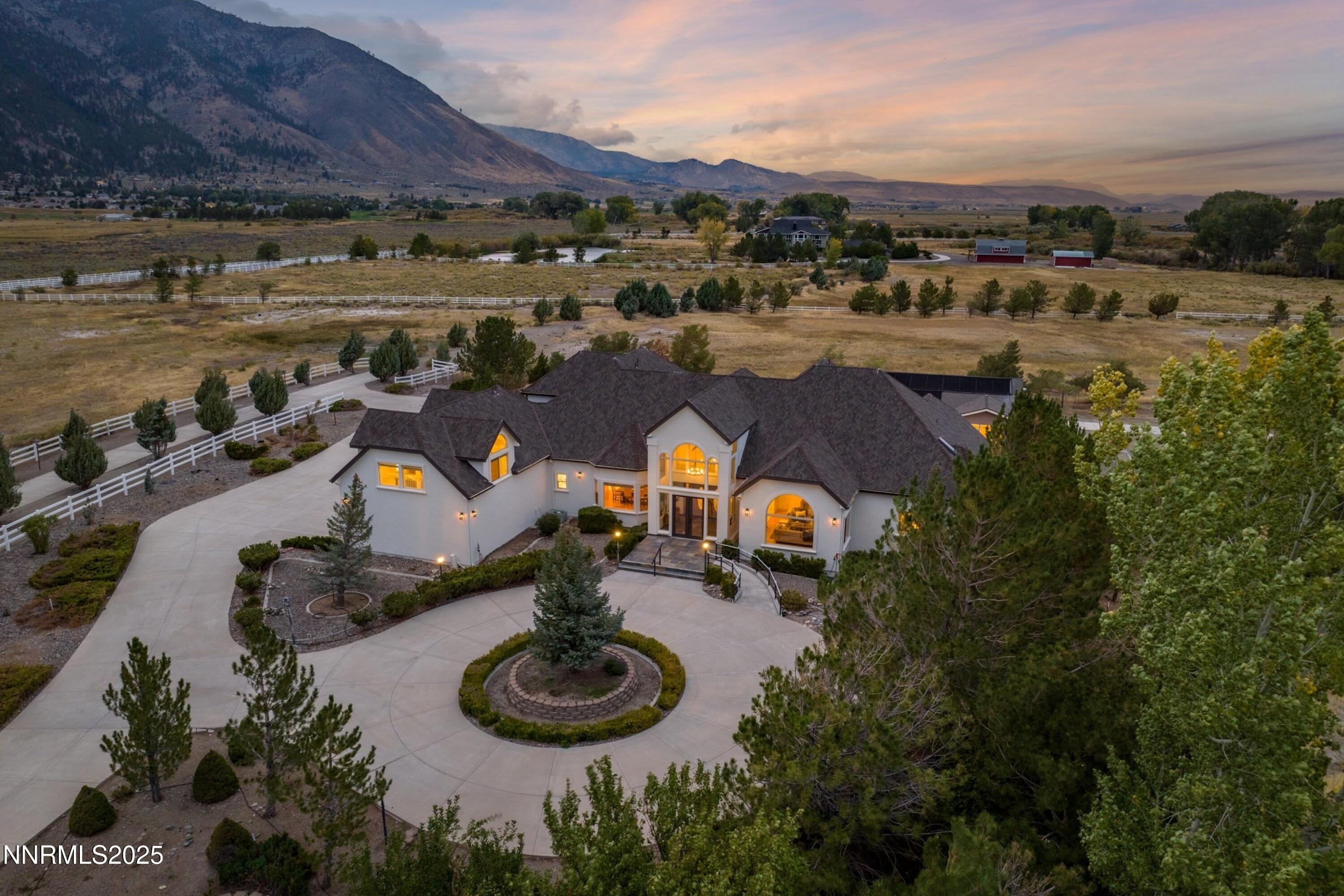 370 Genoa Lane Minden, NV 89423 - Photo 7 of 54 a view of a lake with outside dining space