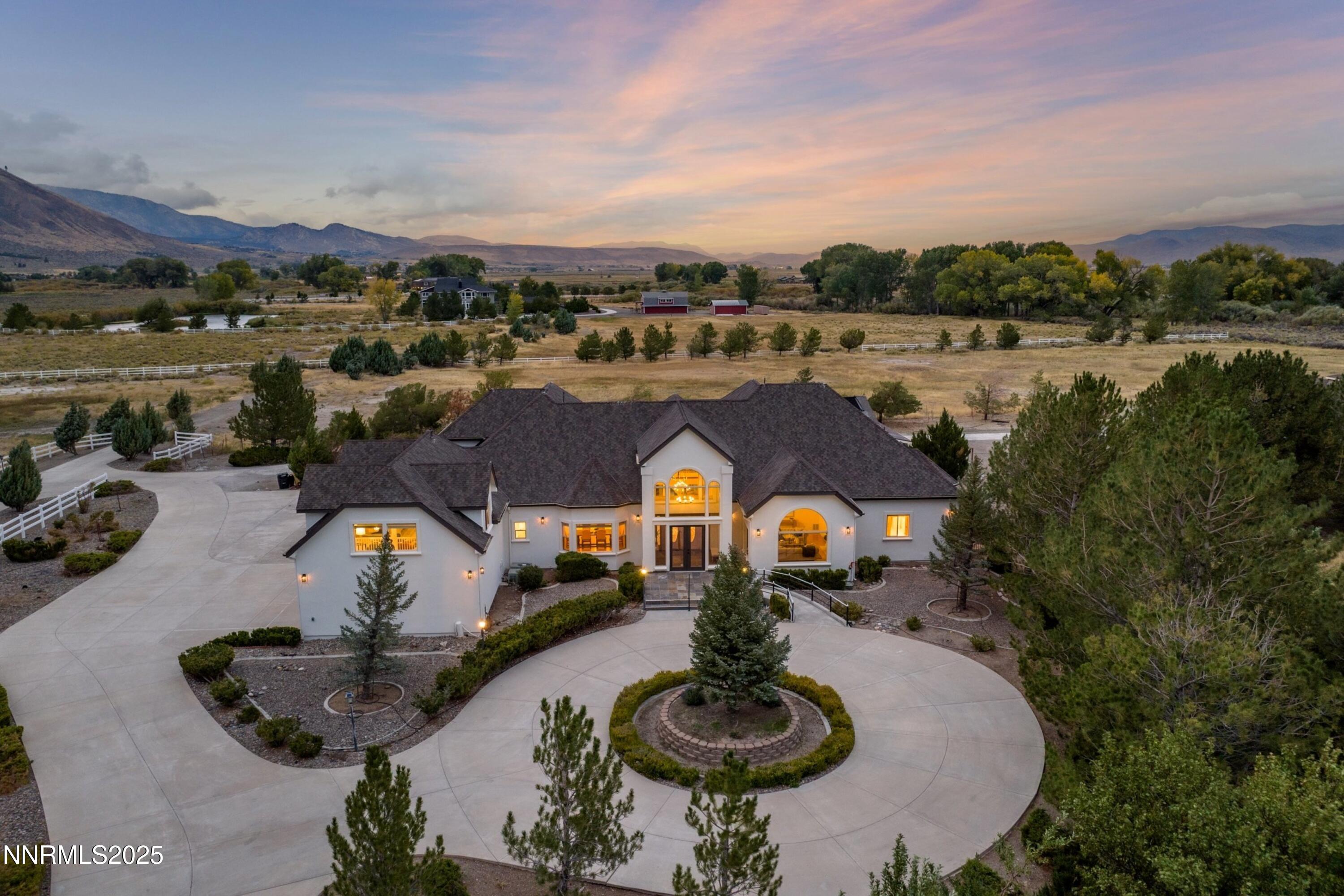 370 Genoa Lane Minden, NV 89423 - Photo 8 of 54 an aerial view of a house with garden space and lake view