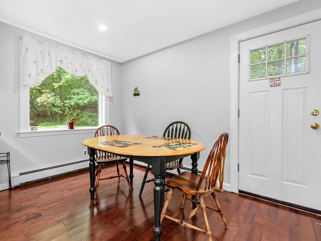 263 Cordaville Road Ashland, MA 01721 - Photo 4 of 18 a view of a dining room with furniture window and wooden floor