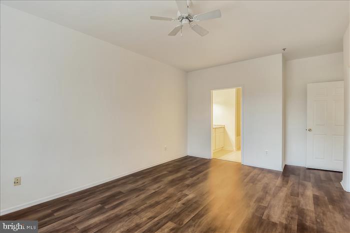 1601 Spring Gate Dr., Unit 1110 McLean, VA 22102 - Photo 17 of 26 wooden floor in an empty room