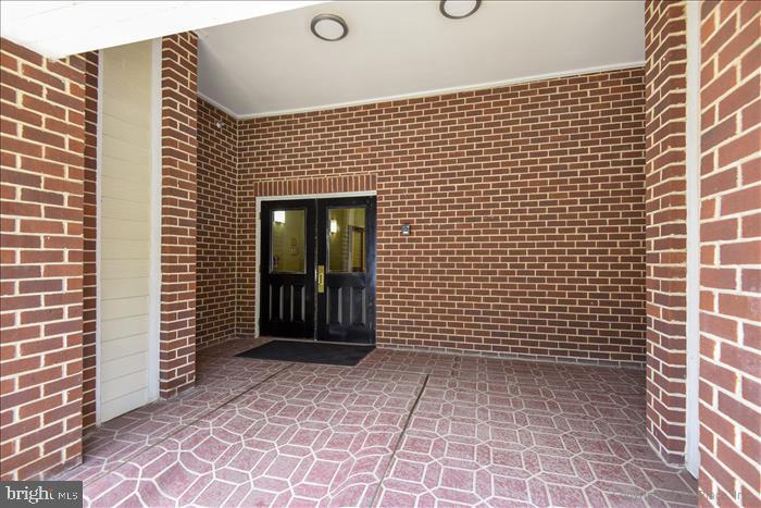 1601 Spring Gate Dr., Unit 1110 McLean, VA 22102 - Photo 9 of 26 a view of a brick wall