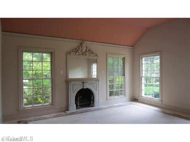 1201 Arbor Road Winston-Salem, NC 27104 - Photo 5 of 16 Master Bedroom. Master Bedroom with fabulous carved fireplace and intricate moldings