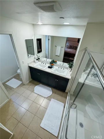 a view of a hallway with workspace and a window