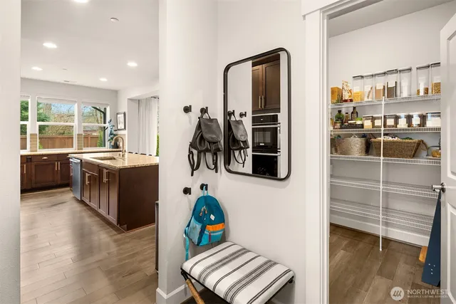 a living room with furniture fireplace and flat screen tv