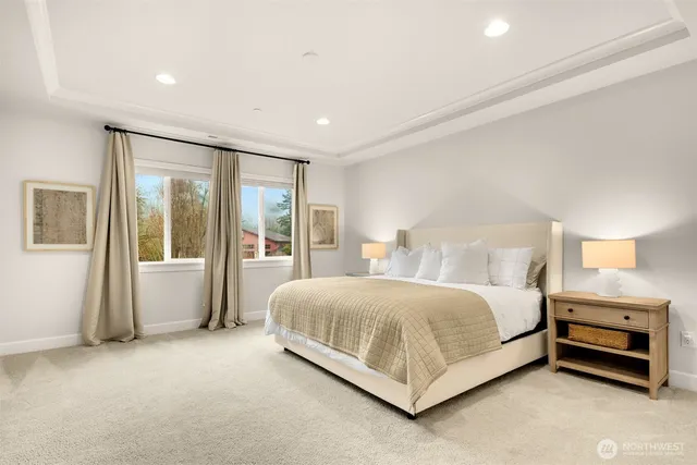 a bed room with a bed and a television