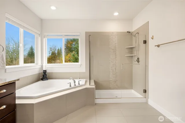 a bathroom with a sink a vanity and a mirror