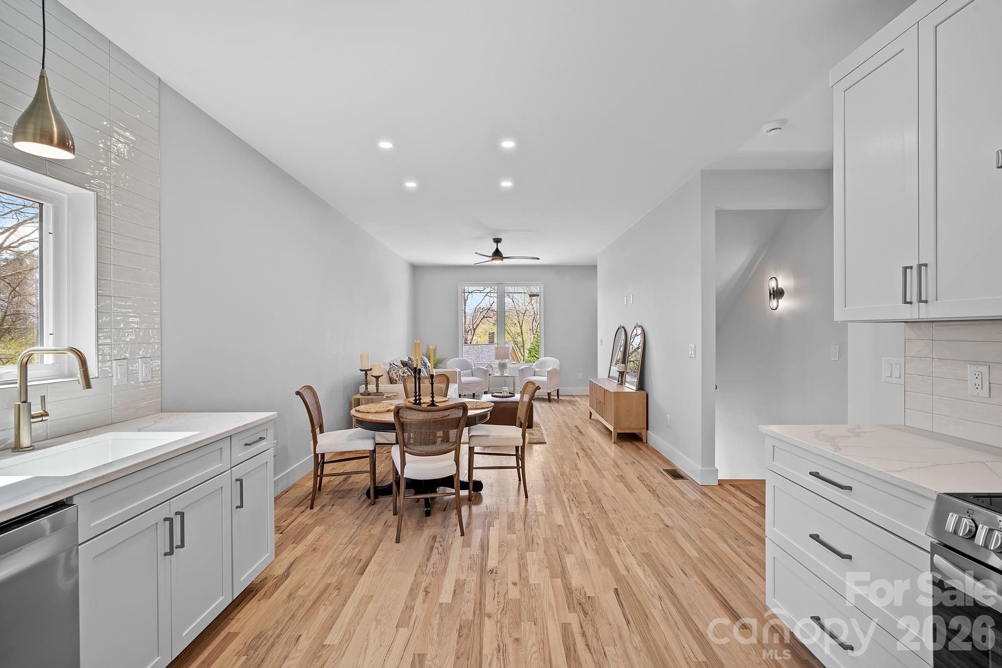 9 Gudger Road Asheville, NC 28715 - Photo 11 of 43 a living room with furniture and wooden floor