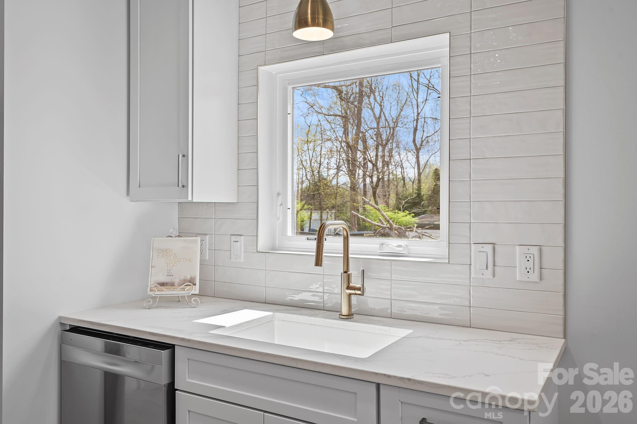 9 Gudger Road Asheville, NC 28715 - Photo 13 of 43 a bathroom with a sink and a bathtub