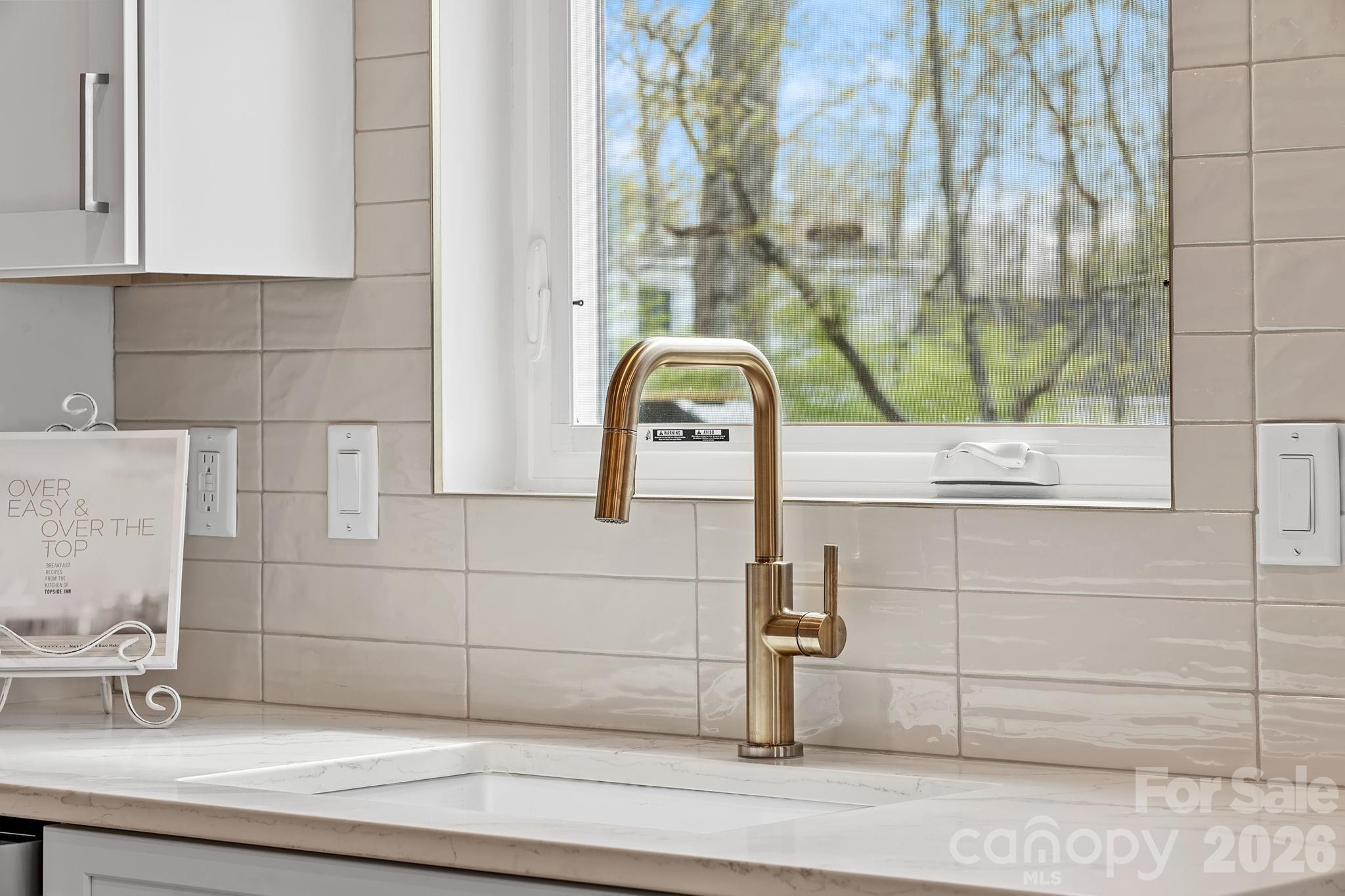 9 Gudger Road Asheville, NC 28715 - Photo 14 of 43 a bathroom with a sink and a mirror