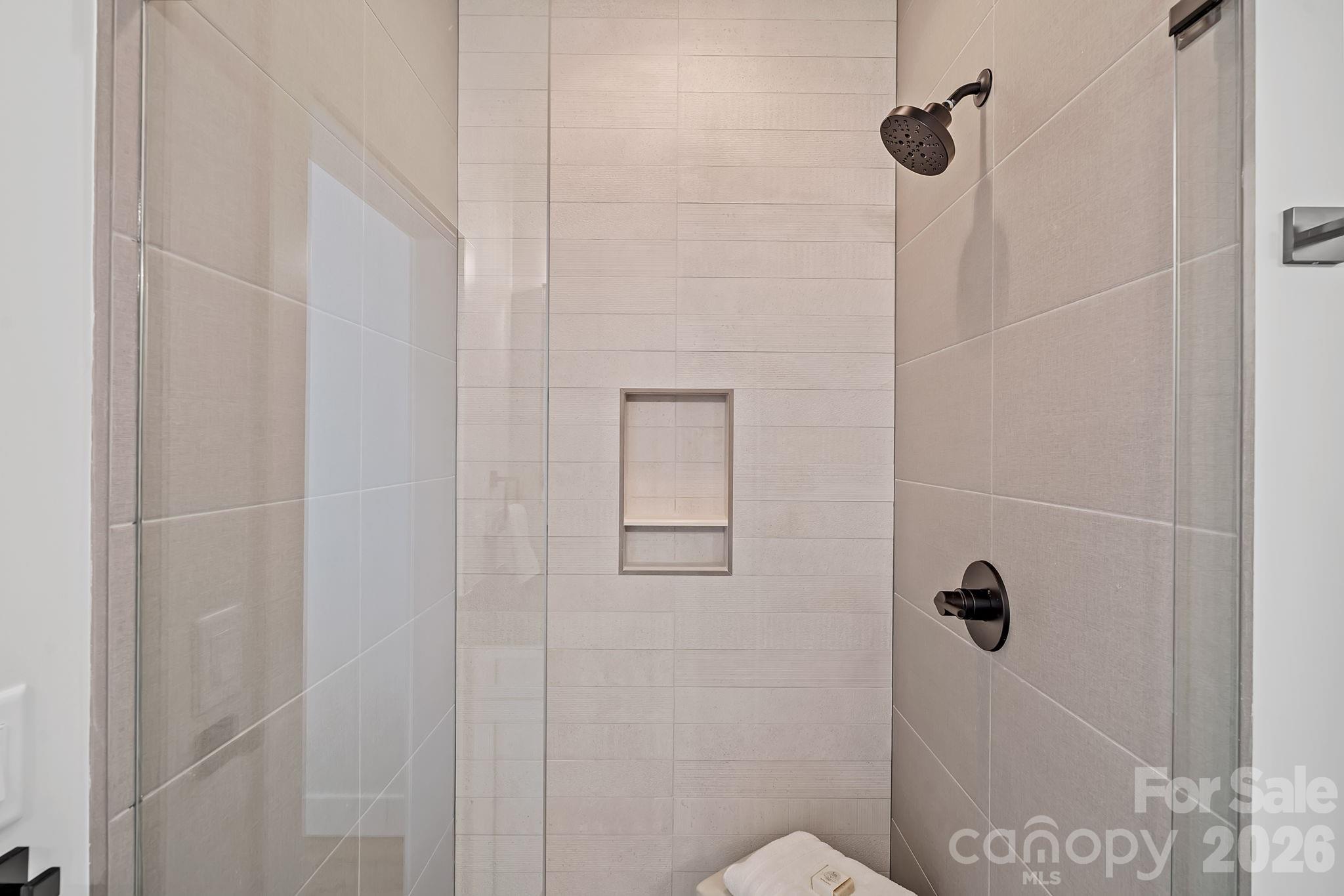 9 Gudger Road Asheville, NC 28715 - Photo 29 of 43 a bathroom with a shower