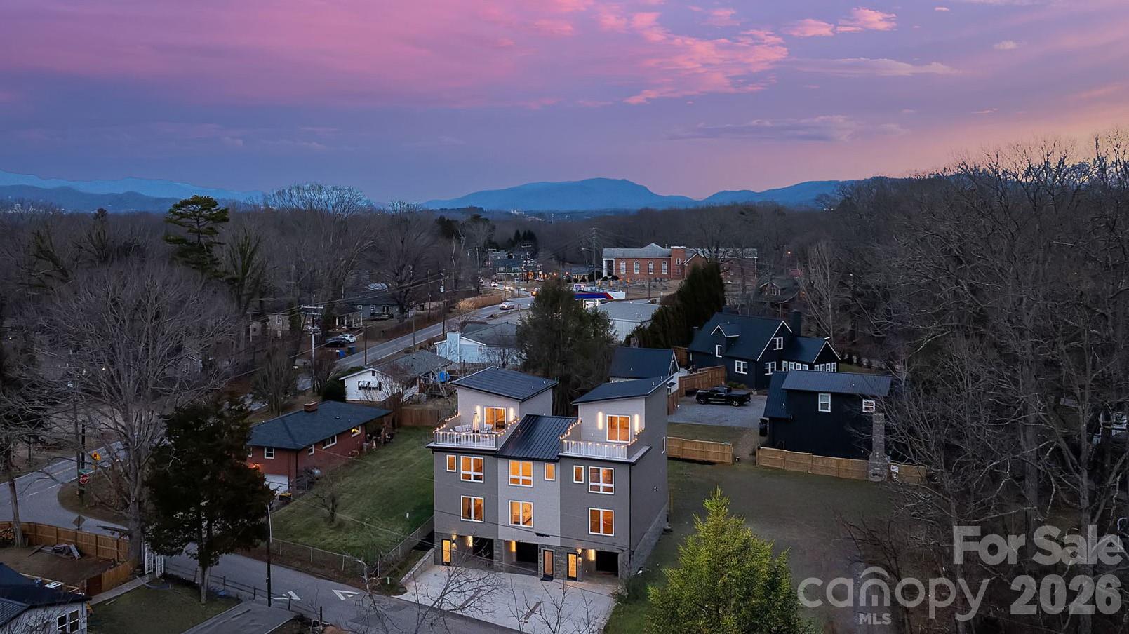 9 Gudger Road Asheville, NC 28715 - Photo 43 of 43 a view of a city with sunset view