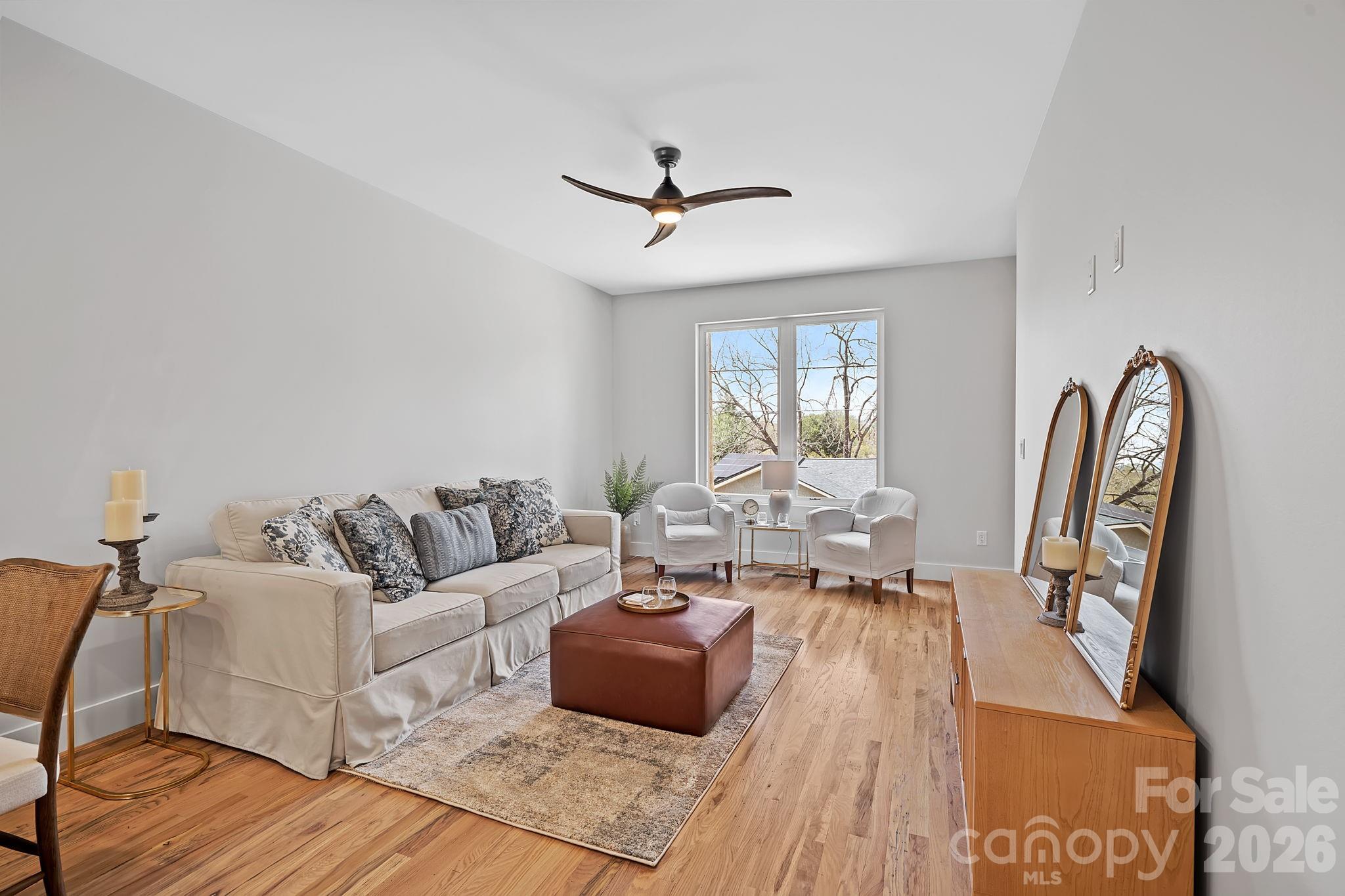 9 Gudger Road Asheville, NC 28715 - Photo 7 of 43 a living room with furniture and a large window