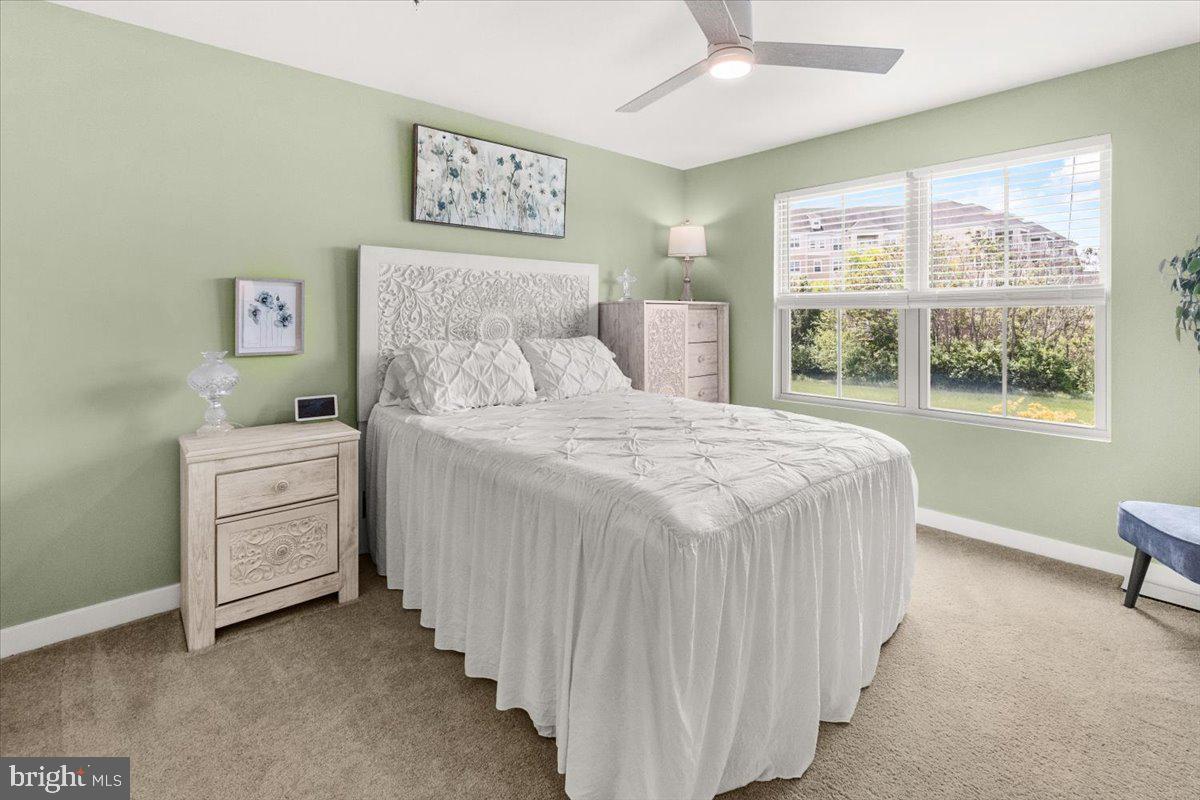 312 Hammersmith Circle Frederick, MD 21702 - Photo 14 of 41 a bedroom with a bed and a window