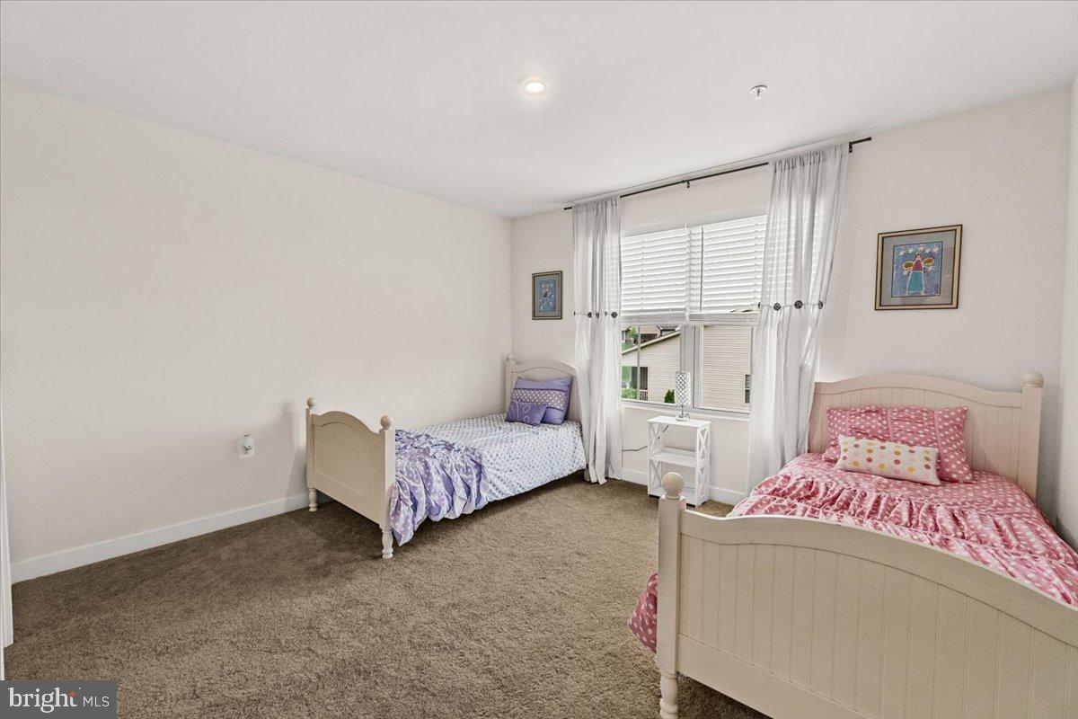 312 Hammersmith Circle Frederick, MD 21702 - Photo 21 of 41 a bedroom with a bed and window