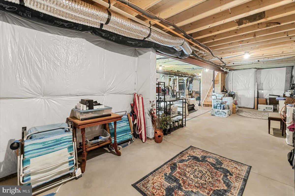 312 Hammersmith Circle Frederick, MD 21702 - Photo 25 of 41 a view of a room with gym equipment