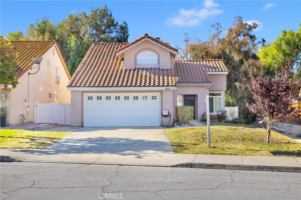 40243 Mimulus Way Temecula, CA 92591 - Photo 1 of 33 a front view of a house with garden