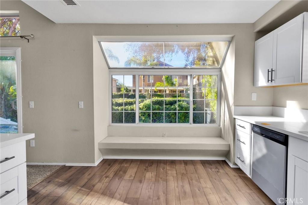 40243 Mimulus Way Temecula, CA 92591 - Photo 13 of 33 a bathroom with a bathtub and a window