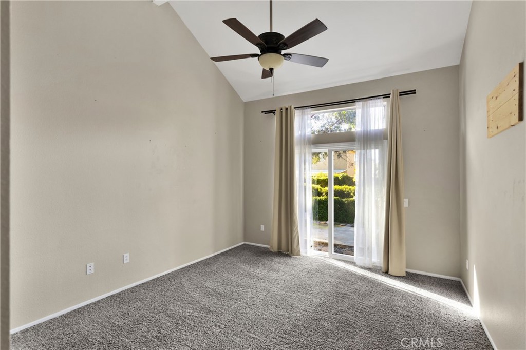 40243 Mimulus Way Temecula, CA 92591 - Photo 15 of 33 a view of a livingroom with a ceiling fan and window