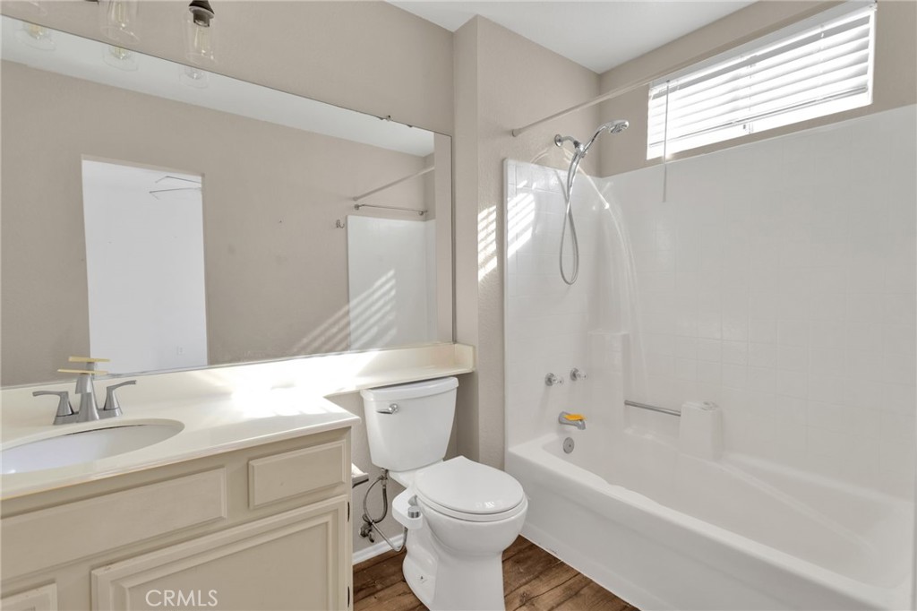 40243 Mimulus Way Temecula, CA 92591 - Photo 26 of 33 a bathroom with a sink toilet and shower